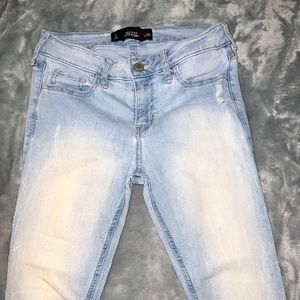 Slightly ripped light blue Hollister skinny jeans